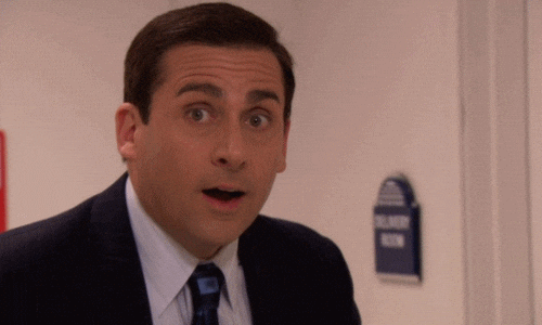 Michael Scott realizing something and smiling